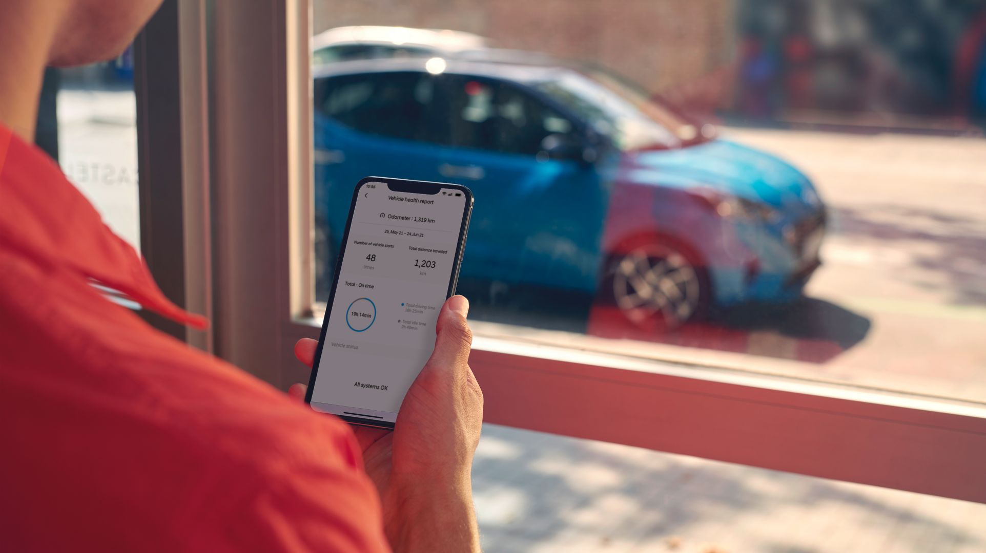 Close-up of the Hyundai Bluelink app with the electric vehicle features on the screen.