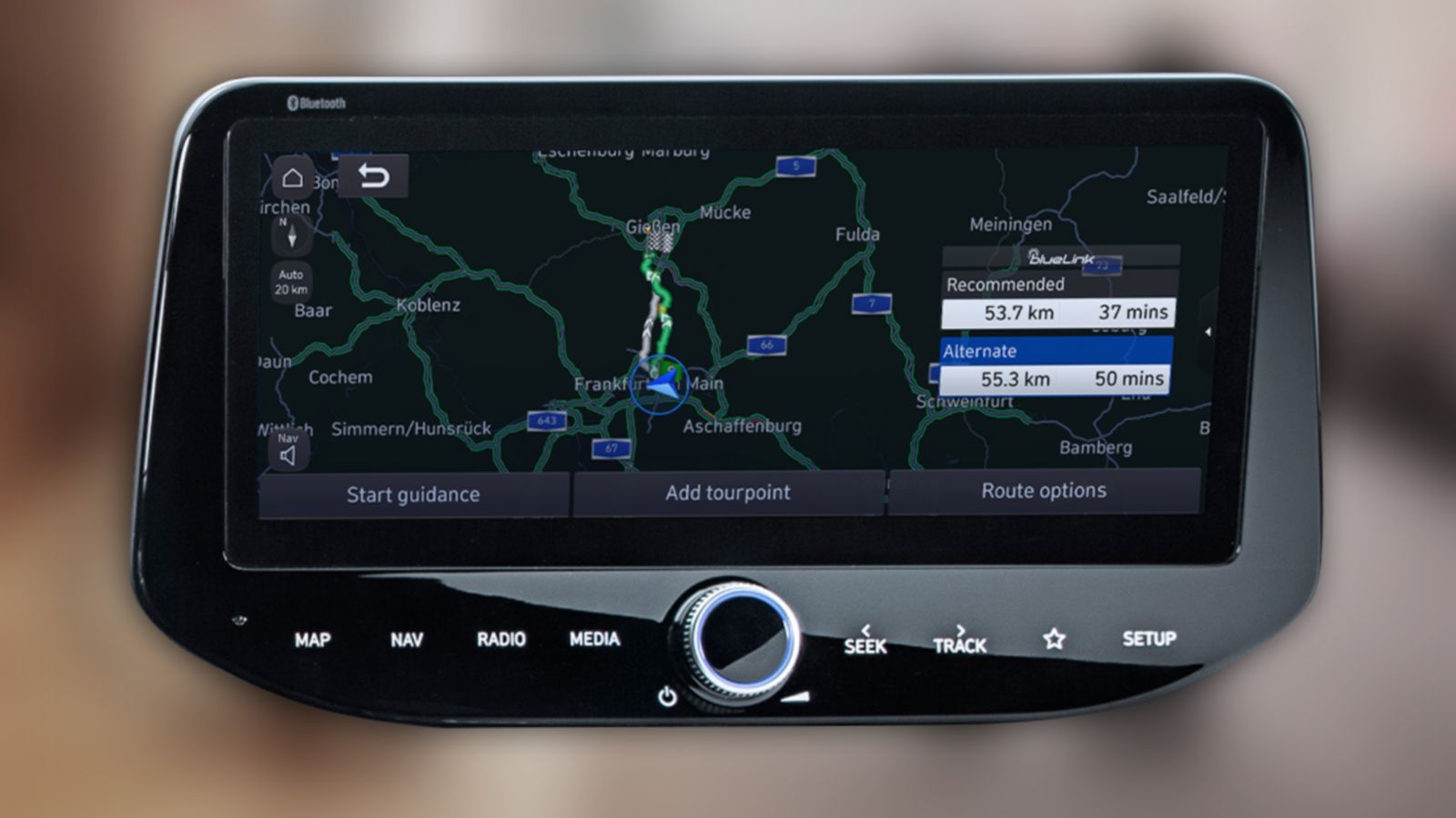 Close-up of a Hyundai touchscreen showing navigation with connected routing.